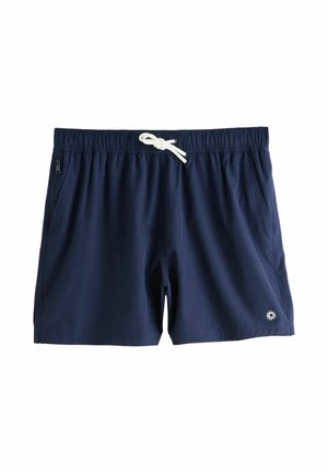 Mereväe sinised ujumispüksid kergest kangast, millel on valge nööriga elastne vöökoht, küljetaskud ja väike valge logo.