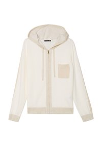Sweat à zip couleur beige clair en tissu doux, avec une finition texturée, des manches longues et une petite poche avant. Accentué par une capuche assortie.