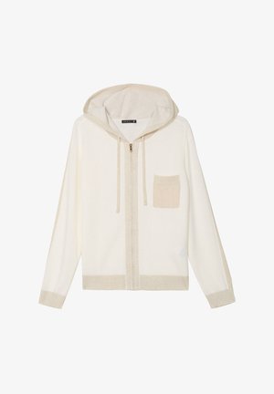 Felpa con zip di colore beige chiaro, realizzata in tessuto morbido, con una finitura testurizzata, maniche lunghe e una piccola tasca frontale. Arricchita da un cappuccio abbinato.