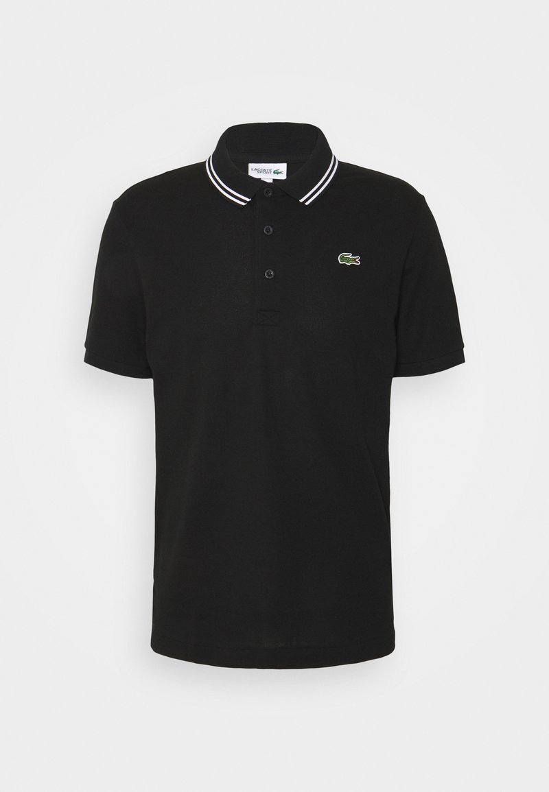 Polo noir à manches courtes avec trois boutons, double bandes blanches sur le col et petit logo crocodile vert brodé sur la poitrine.
