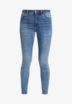 Helle blaue Skinny Jeans aus Denim mit einem verwaschenen Finish, ausgestattet mit einem klassischen Fünf-Taschen-Design und einem Reißverschluss mit Knopfverschluss.