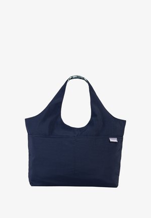Sac fourre-tout en tissu marine avec un grand dessus ouvert, une large bandoulière et une poche avant. Il présente un motif intérieur contrastant et une étiquette de logo.