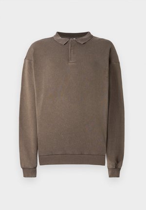 Brown long-sleeve polo shirt with a standard collar, ribbed cuffs, and a soft texture. Features a small logo on the left chest.