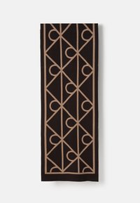 Black rectangular fabric with beige geometric pattern of intersecting diagonal lines and semicircles contained within a border.