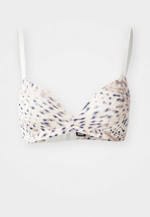 Trekantet bralette i et lyst beige og blått prikket mønster, med tynne justerbare stropper og et mykt, elastisk stoff. Logomerke nederst.