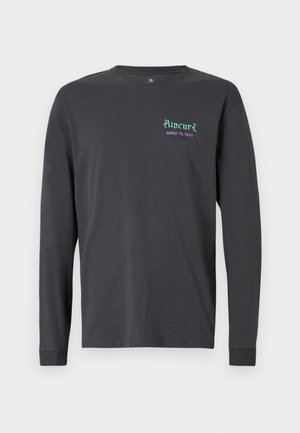 Langärmliges graues T-Shirt aus Baumwolle. Verfügt über ein vorderes Logo in grüner und lila Schrift. Rundhalsausschnitt und gerippte Bündchen. Einfaches Design.