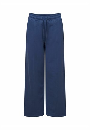 Navy luźne spodnie typu wide-leg z elastycznym pasem i sznurkiem, wykonane z miękkiego materiału, z bocznymi kieszeniami.