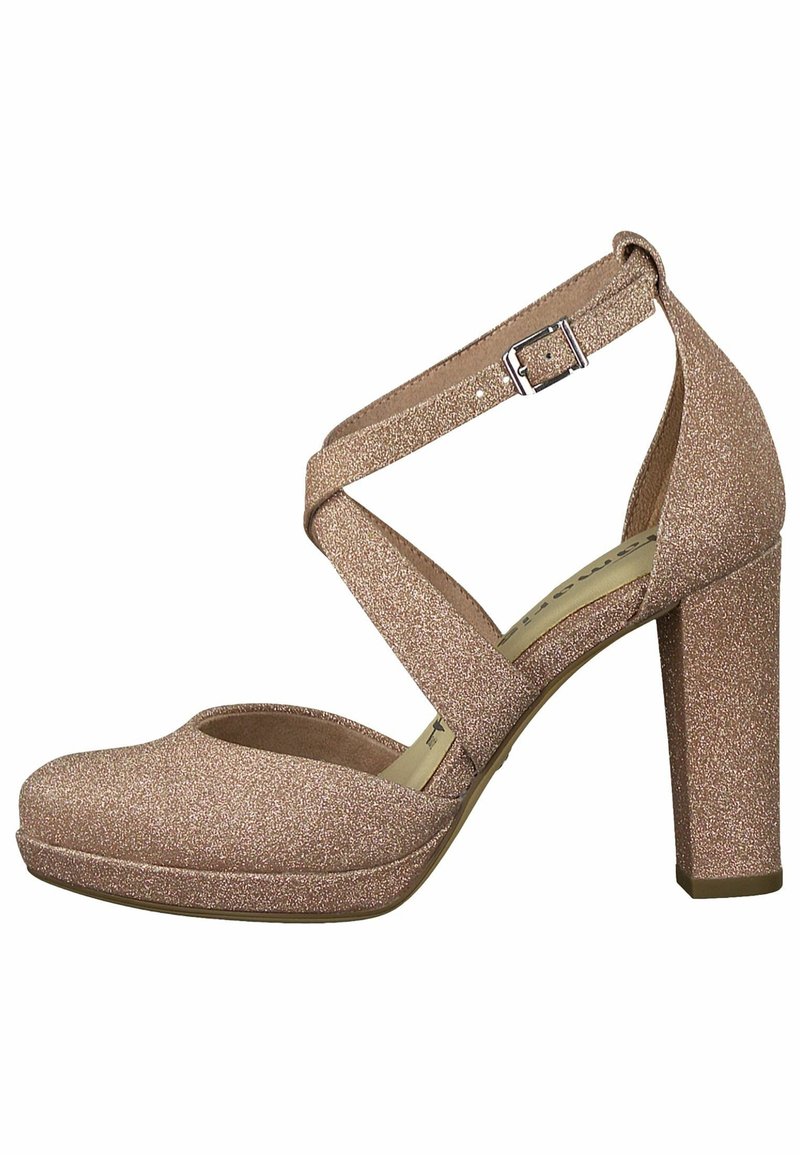 Chaussure à talon haut fermée en paillettes or rose avec des brides croisées à la cheville et une fermeture à boucle argentée.