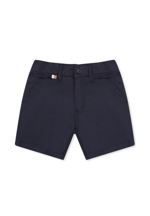 Pantaloni corti blu navy realizzati in tessuto liscio, con chiusura a bottone, tasche frontali e un piccolo logo d'accento vicino all'orlo della vita.
