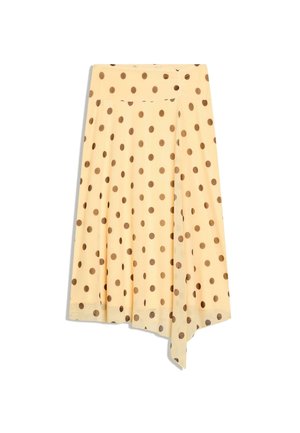 Jupe midi jaune clair à pois marron, avec un ourlet asymétrique et de doux plis à l’avant.