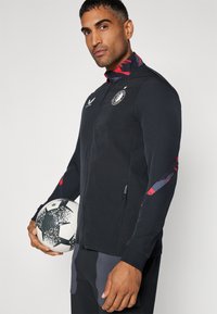 Castore FEYENOORD ROTTERDAM LEAGUE MATCHDAY ANTHEM JACKET - Klub merchandise - caviar/tomato