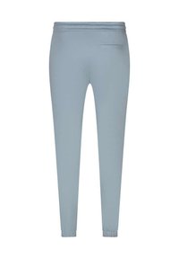 Pantalons de jogging bleu clair avec une texture lisse, une taille élastique et une poche arrière unique ; design fuselé avec des poignets élastiques aux chevilles.