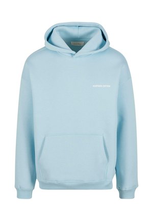 Lyseblå hettegenser laget av bomull. Har en lomme foran, ribbestrikkede mansjetter og en liten hvit logo som sier "ANOTHER COTTON" på brystet.