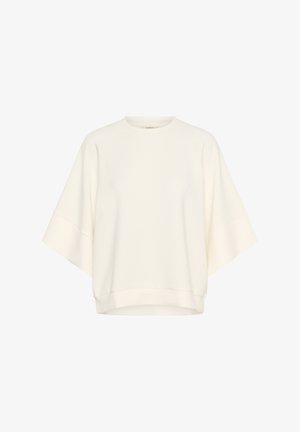 Kreemivärvi üle suuruse sweatshird, raglanvarrukatega, ümar kaelus ja pehme, tekstuuriga materjal. Hem lõpetab vöökoht.