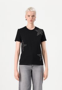 Black cotton t-shirt featuring silver star embellishments on the chest and side, short sleeves, and a classic crew neckline.