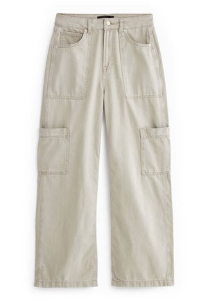 Beige bukser med vide ben og store for- og cargolommer, knaplukning og bæltestropper, vist fladt på en hvid baggrund.