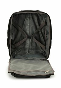 Zaino nero con interni grigi, dotato di cinturini per fissare il contenuto, una tasca in rete con zip e una superficie liscia e resistente.