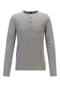 Šedá dlouhá halenka s knoflíky u límce, se třemi knoflíky, ribbovaná textura a rovný střih. Jednoduchý design bez vzorů nebo akcentů.