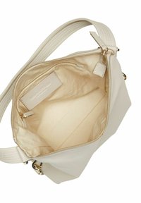 Handtasche aus cremfarbenem Leder mit glatter Oberfläche, Reißverschluss und Innenfutter. Verfügt über einen einzelnen Schultergurt und eine kleine Tasche im Inneren.