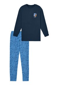 Navy long-sleeve shirt with logo and blue pants featuring a playful animal print. Both garments made from soft, comfortable fabric.