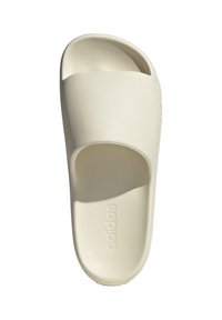 Infradito di colore crema realizzato in gomma testurizzata, con una fascia ampia e un logo discreto lungo il lato. Suola liscia per il massimo comfort.