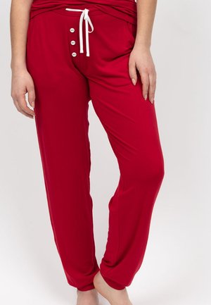 Rote Loungehosen aus weichem Stoff, mit einem Kordelzugbund, weißen Knopfdetails und seitlichen Taschen für zusätzliche Funktionalität.