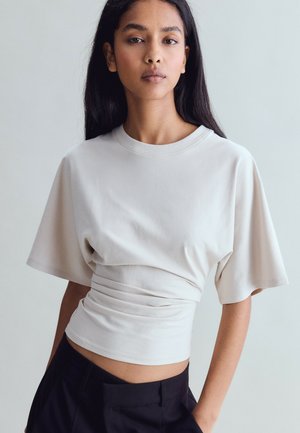 Stradivarius, SHORT KIMONO SLEEVE T-SHIRT - T-shirt imprimé - mottled light brown