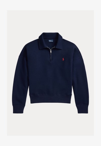 Sudadera de cuello alto con cremallera hasta un cuarto, en azul marino, con cuello, puños y dobladillo acanalados, y logo bordado de Polo Ralph Lauren en rojo en el pecho.