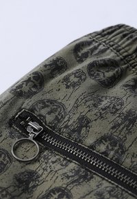 Former Nadrágok - sage