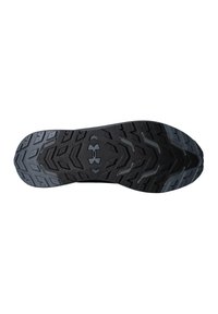 Suola nera di scarpa sportiva con un motivo testurizzato, con un logo al centro. Design a battistrada profondo per trazione e stabilità.