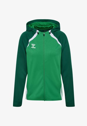 Groene ritssluitingjack met capuchon, met witte accenten en een mesh-textuur. Inclusief een logo op de borst en verstelbare trekkoorden voor de capuchon.