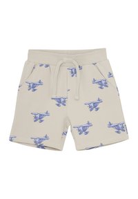 Beige bomullsshorts med elastisk midja och dragsnöre, med ett upprepat blått flygplansgrafikmönster.