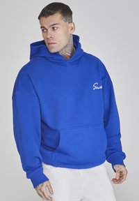 Felpa blu realizzata in tessuto morbido, con tasca frontale e cappuccio con coulisse. Logo bianco semplice sul lato sinistro del petto.