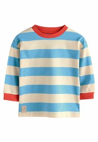 Maglietta a maniche lunghe di colore crema con righe orizzontali blu chiaro e blu scuro. Collo e polsini a costine rossi. Presenta un piccolo logo sul bordo.