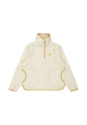 Pullover in pile color crema con colletto alto, apertura a metà con bottoni, accentuato da cuciture gialle e grandi tasche laterali. Texture morbida.