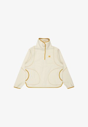 Pullover in pile color crema con colletto alto, apertura a metà con bottoni, accentuato da cuciture gialle e grandi tasche laterali. Texture morbida.