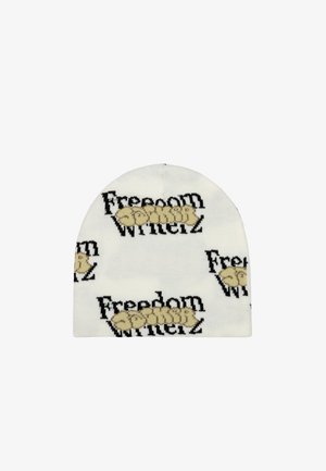Gorro de punto blanco con diseño de texto repetido en negro y dorado que dice "Libertad" y "Ganadores", con una textura suave y parte superior redondeada.