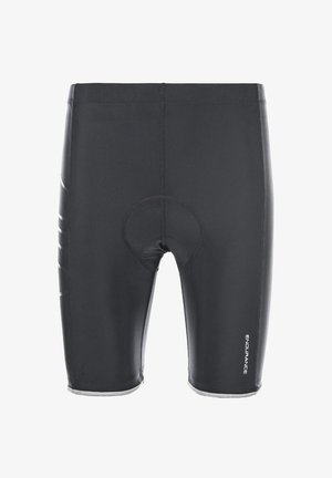 Sorte cykelshorts lavet af strækbart materiale, med polstret sædeområde, reflekterende elementer og flade sømme for at reducere gnidninger.