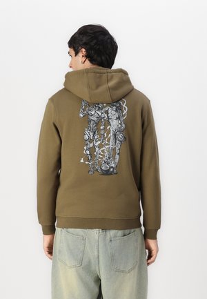 Olive green hoodie with a drawstring hood and a graphic print of two figures on the back. Made from soft, textured fabric.