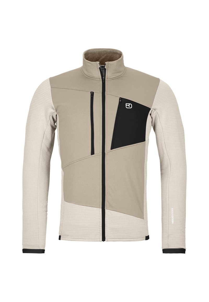 Beige Jacke mit schwarzen Akzenten, hohem Kragen, Reißverschlusstasche auf der Brust, strukturierten Ärmeln und einem geometrischen Design auf der Vorderseite.