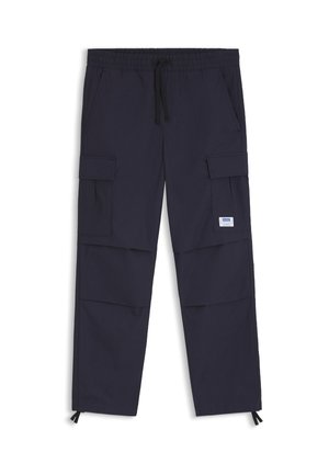 Navy cargo pants made from a lightweight fabric, featuring an elastic waistband, drawstring, multiple pockets, and ankle zippers.
