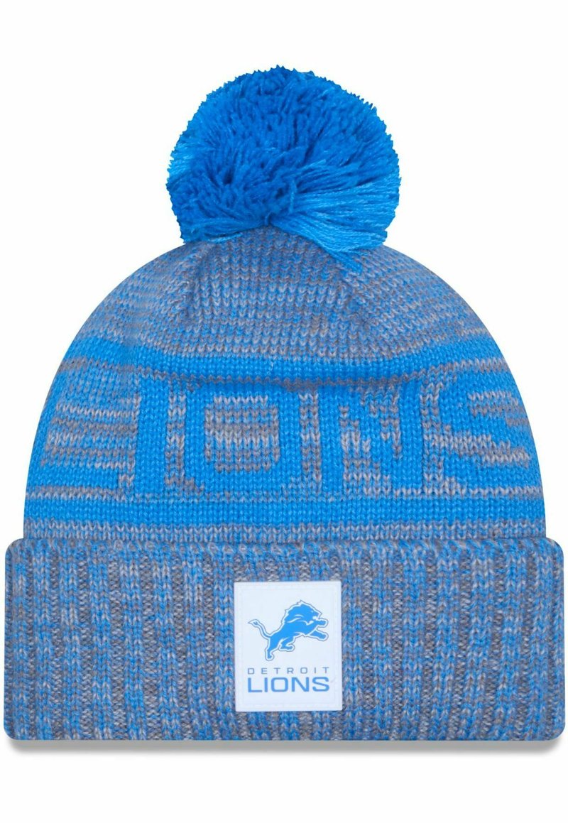 Blaues Strickmütze mit einem Pompon auf der Oberseite, ausgestattet mit einem strukturierten Design und einem umgeschlagenen Bund, der "DETROIT LIONS" und ein Logo zeigt.
