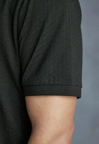 Next Polotričko - olive green