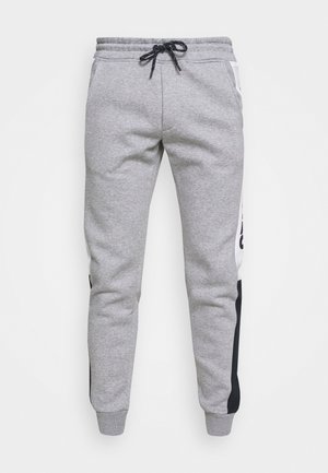Light grey jogger pants with black and white side stripes, black drawstring waist, and cuffed ankles, displayed against a white background.