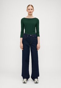ONLY Tall ONLJUICY WIDE RINSE  - Wide leg - dark blue denim