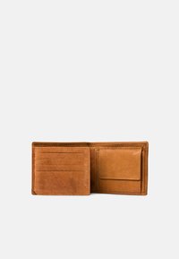 Tan leather wallet with multiple card slots, a contrasting interior pocket, and smooth texture; foldable design enhances functionality.