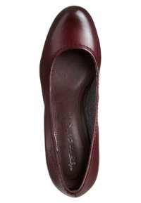 Chaussure plate pour femme en cuir marron foncé avec bout arrondi et coutures apparentes, vue de dessus sur fond blanc.