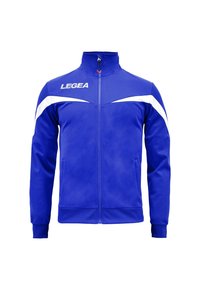 Blå bluzon med lynlås, høj krave, hvide accenter og logo. Lavet af glat materiale, med lange ærmer og to frontlommer.