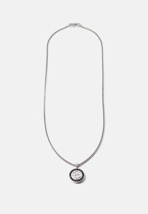 Silver chain necklace featuring a round pendant with a logo surrounded by black gemstones. Sleek, polished finish with a lobster clasp.