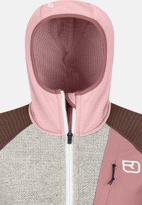 Hoodiejacke mit einem weichen, rosa oberen Abschnitt, grauem strukturiertem Körper und braunen Schulterpaneelen. Sie verfügt über einen Frontreißverschluss und ein Logodetail.